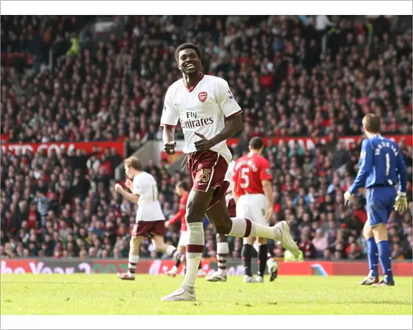 Emmanuel Adebayor celebrates scoring the Arsenal goal