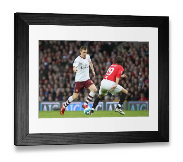 Framed Print : Nicklas Bendtner (Arsenal) Gerard Pique (Manchester United) Framed Print : Nicklas Bendtner (Arsenal) Gerard Pique (Manchester United)