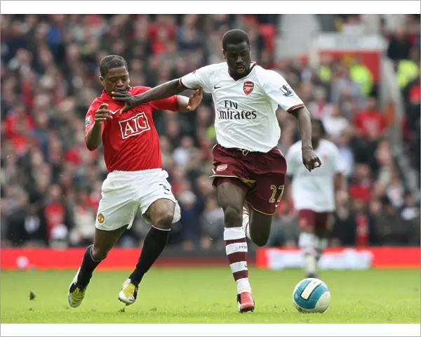 Emmanuel Eboue (Arsenal) Patrice Evra (Manchester United)