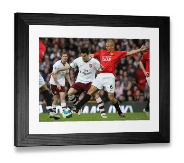 Framed Print : Cesc Fabregas (Arsenal) Wes Brown (Manchester United)