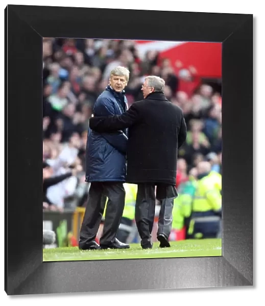Arsenal manager Arsene Wenger with Manchester United manager Alex Ferguson after the match