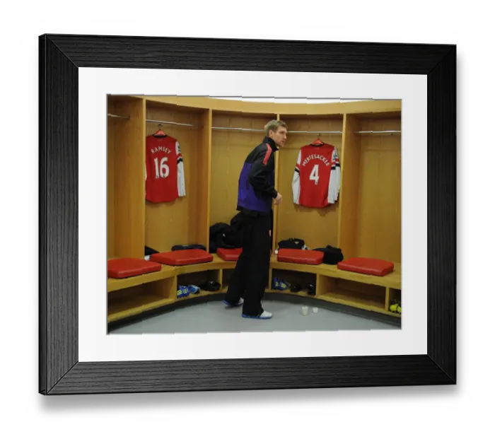Framed Print : Per Mertesacker: Steeling Focus before Arsenal's Battle against West Ham United, Premier League 2012-13