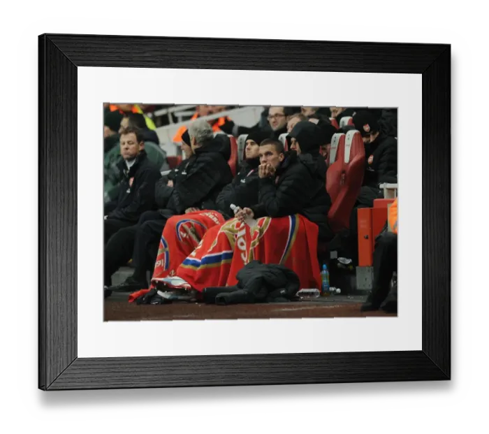 Framed Print : Arsenal's Lukas Podolski Faces Off Against West Ham in Premier League Showdown Framed Print : Arsenal's Lukas Podolski Faces Off Against West Ham in Premier League Showdown