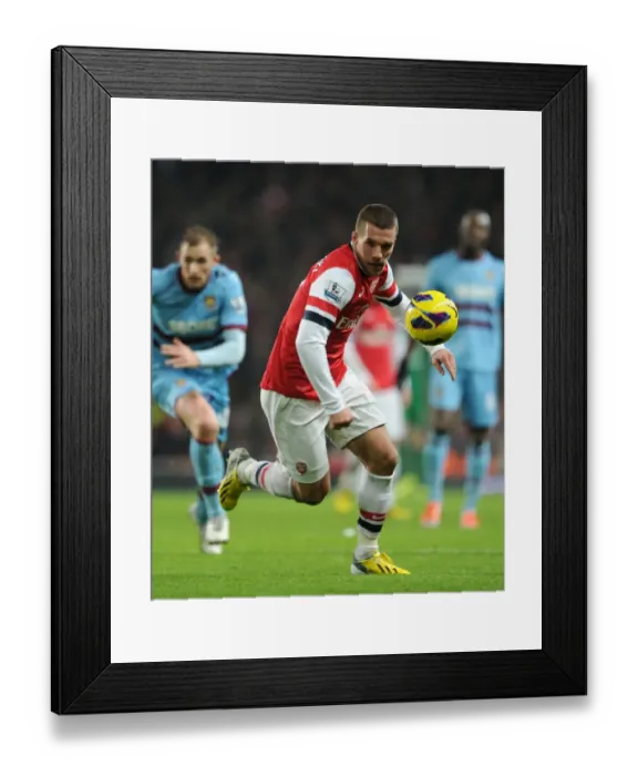 Framed Print : Lukas Podolski in Action: Arsenal vs West Ham United, Premier League 2012-13
