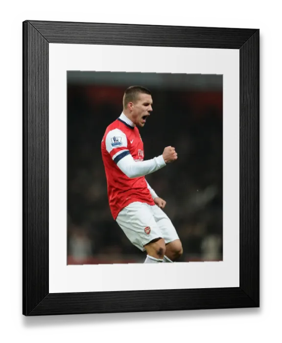 Framed Print : Lukas Podolski Scores First Goal: Arsenal vs West Ham United, Premier League 2012-13