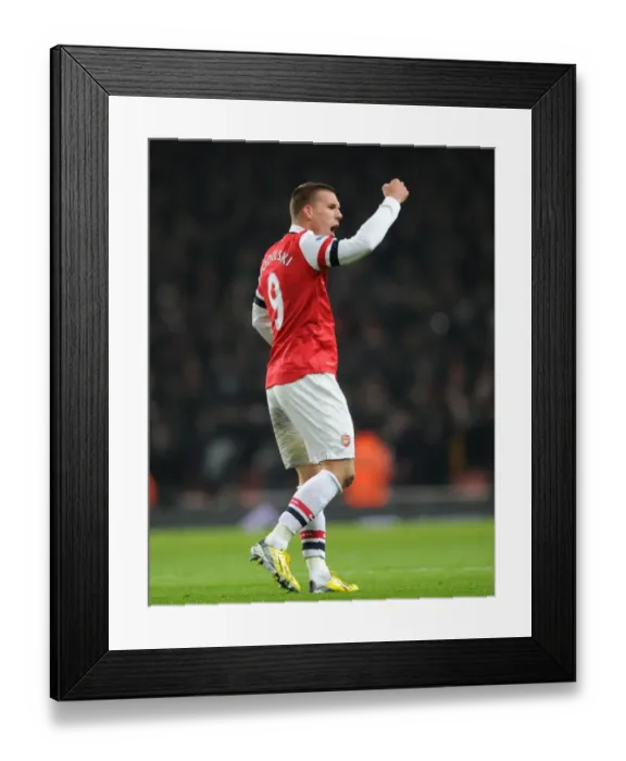 Framed Print : Podolski Scores First Goal: Arsenal vs West Ham United, Premier League 2012-13