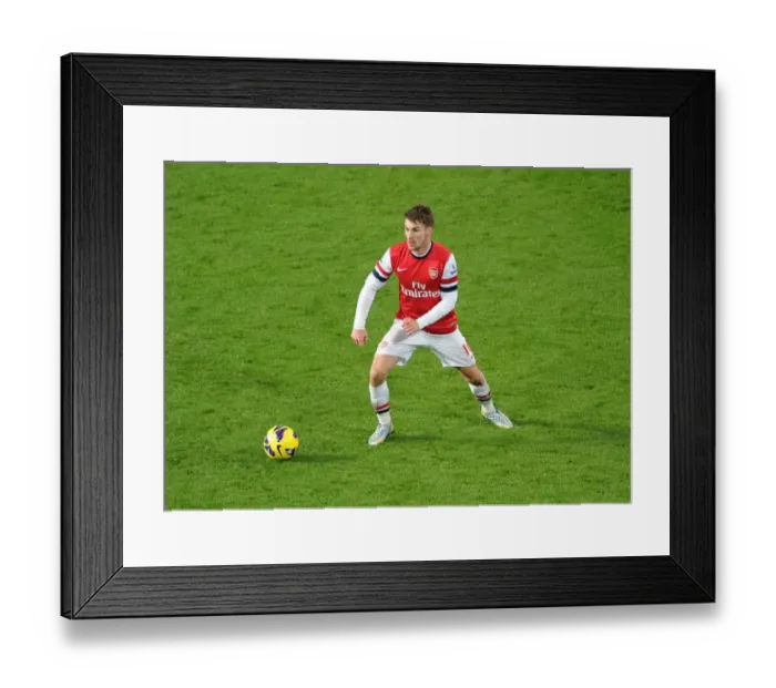 Framed Print : Aaron Ramsey in Action: Arsenal vs. West Ham United, Premier League 2012-13 Framed Print : Aaron Ramsey in Action: Arsenal vs. West Ham United, Premier League 2012-13