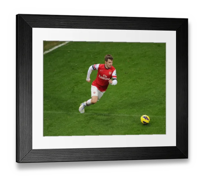Framed Print : Aaron Ramsey in Action: Arsenal vs. West Ham United, Premier League 2012-13
