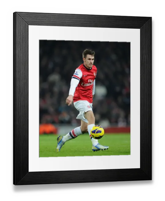 Framed Print : Aaron Ramsey in Action: Arsenal vs West Ham United, Premier League 2012-13