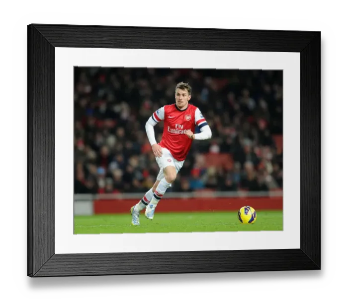 Framed Print : Aaron Ramsey in Action: Arsenal vs. West Ham United, Premier League 2012-13