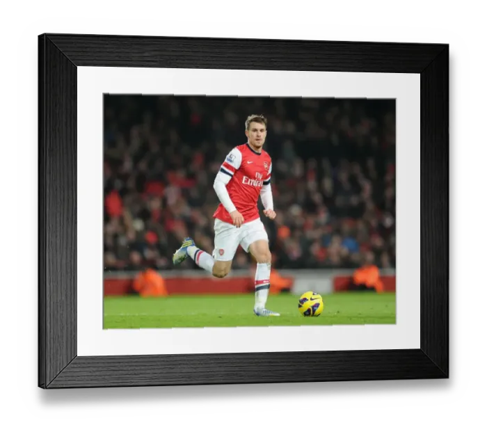 Framed Print : Aaron Ramsey in Action: Arsenal vs. West Ham United, Premier League 2012-13 Framed Print : Aaron Ramsey in Action: Arsenal vs. West Ham United, Premier League 2012-13