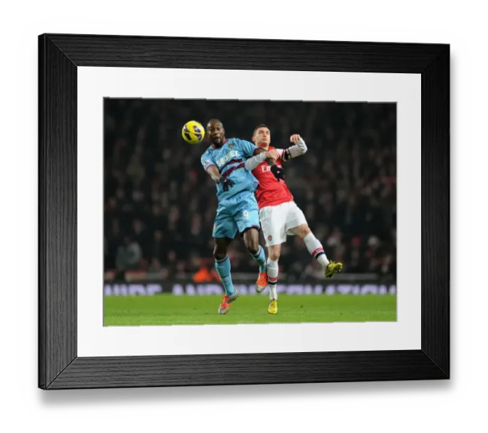 Framed Print : Clash at the Emirates: Vermaelen vs. Cole, Arsenal vs. West Ham United (2012-13) Framed Print : Clash at the Emirates: Vermaelen vs. Cole, Arsenal vs. West Ham United (2012-13)