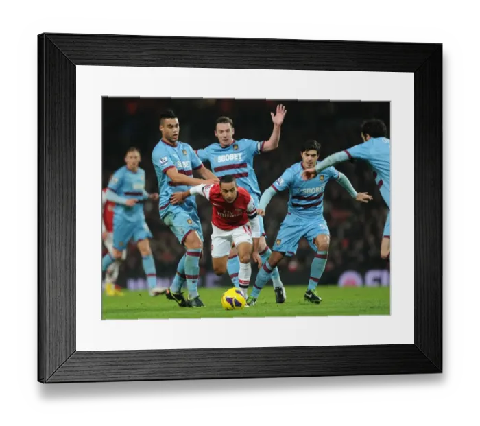 Framed Print : Theo Walcott vs. Winston Reid, Kevin Nolan, James Tomkins, and Joey O'Brien: Arsenal vs. West Ham United, Premier League Showdown