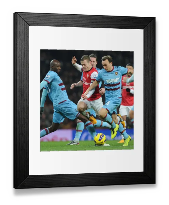 Framed Print : Jack Wilshere Tackles Alou Diarra and Mark Noble: Arsenal vs West Ham United, Premier League 2012-13