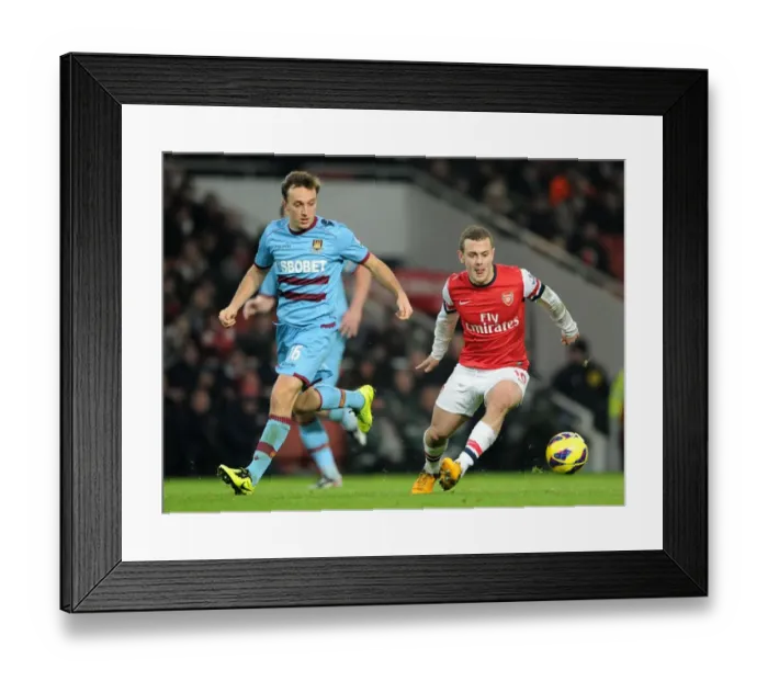 Framed Print : Intense Rivalry: Jack Wilshere vs. Mark Noble Battle in Arsenal vs. West Ham Showdown Framed Print : Intense Rivalry: Jack Wilshere vs. Mark Noble Battle in Arsenal vs. West Ham Showdown