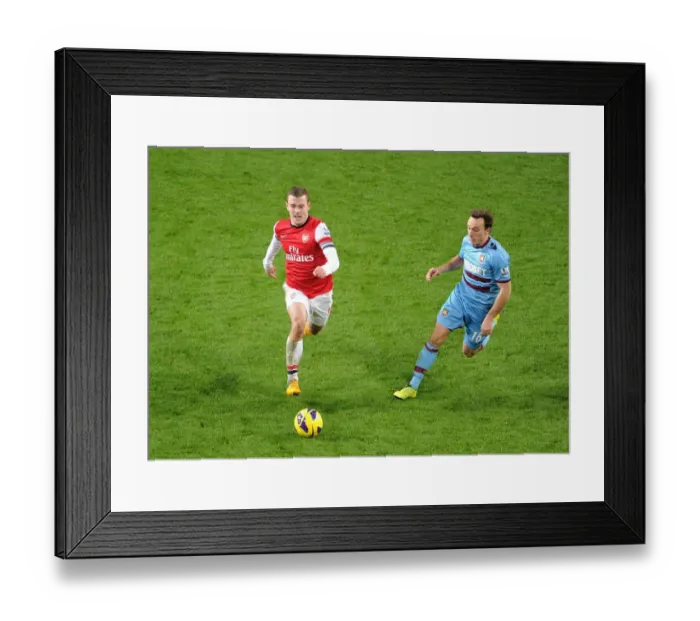 Framed Print : Intense Rivalry: Wilshere vs. Noble - Arsenal vs. West Ham Showdown Framed Print : Intense Rivalry: Wilshere vs. Noble - Arsenal vs. West Ham Showdown