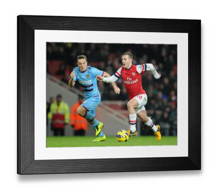 Framed Print : Intense Rivalry: Wilshere vs. Noble Clash in Arsenal vs. West Ham Showdown