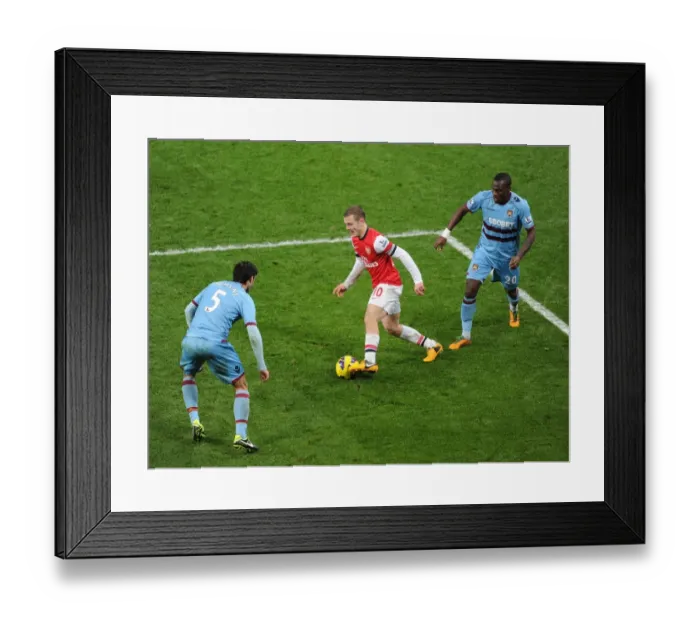 Framed Print : Arsenal vs. West Ham: Wilshere Clashes with Tomkins and Demel