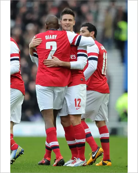 Olivier Giroud celebrates scoring Arsenals 1st goal with Abou Diaby. Brighton & Hove Albion 2