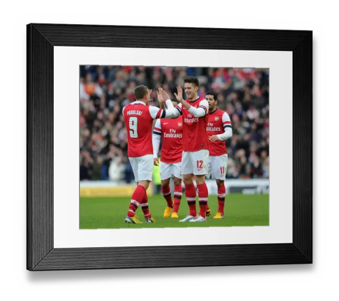 Framed Print : Giroud and Podolski Celebrate Arsenal's First Goal Against Brighton in FA Cup (2012-13)