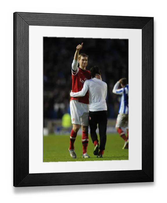 Framed Print : Per Mertesacker and Tomas Rosicky's Emotional Reunion: Arsenal's FA Cup Victory at Brighton & Hove Albion Framed Print : Per Mertesacker and Tomas Rosicky's Emotional Reunion: Arsenal's FA Cup Victory at Brighton & Hove Albion