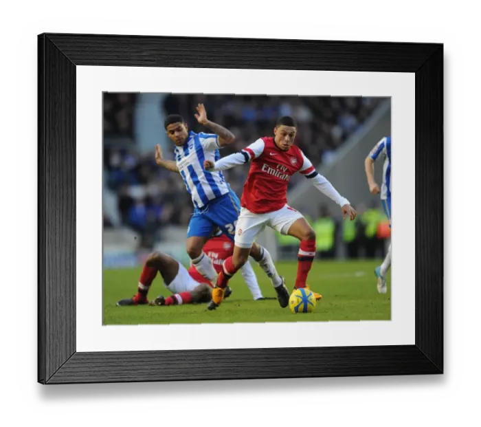 Framed Print : Arsenal's Alex Oxlade-Chamberlain Faces Off Against Brighton's Liam Bridcutt in FA Cup Clash