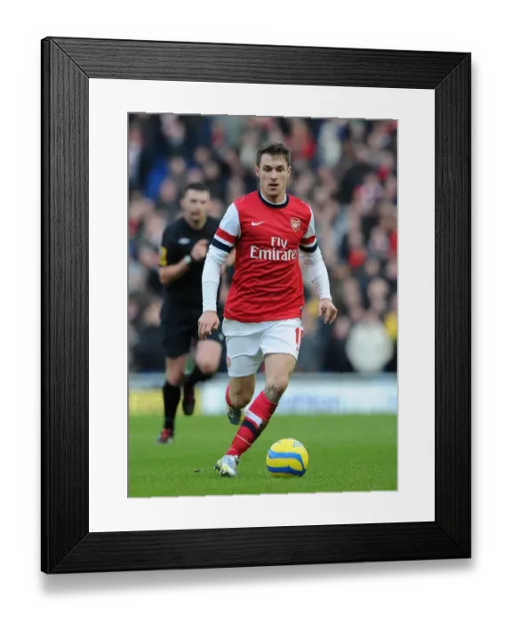 Framed Print : Aaron Ramsey (Arsenal). Brighton & Hove Albion 2: 3 Arsenal. FA Cup 4th Round. The AMEX Stadium Framed Print : Aaron Ramsey (Arsenal). Brighton & Hove Albion 2: 3 Arsenal. FA Cup 4th Round. The AMEX Stadium