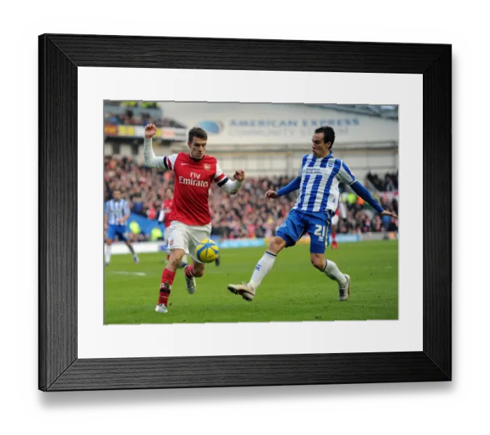 Framed Print : Aaron Ramsey vs. David Lopez: Intense Battle in FA Cup Match between Brighton & Arsenal Framed Print : Aaron Ramsey vs. David Lopez: Intense Battle in FA Cup Match between Brighton & Arsenal