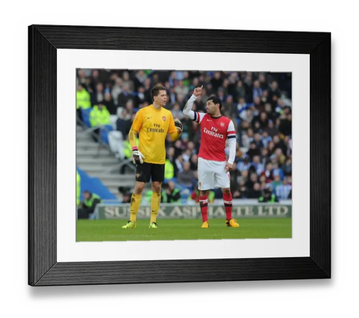Framed Print : Arsenal's Szczesny and Santos Prepare for FA Cup Clash against Brighton & Hove Albion Framed Print : Arsenal's Szczesny and Santos Prepare for FA Cup Clash against Brighton & Hove Albion