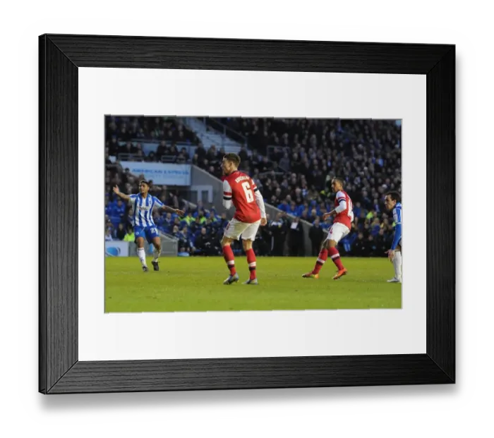 Framed Print : Theo Walcott's Deflected Goal: Arsenal Cruise Past Brighton in FA Cup Framed Print : Theo Walcott's Deflected Goal: Arsenal Cruise Past Brighton in FA Cup