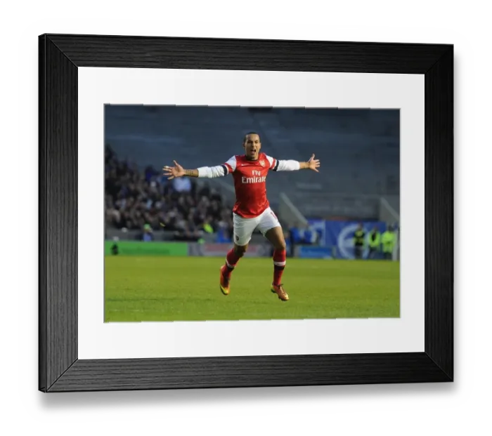 Framed Print : Theo Walcott's Hat-Trick: Arsenal Triumphs Over Brighton in FA Cup