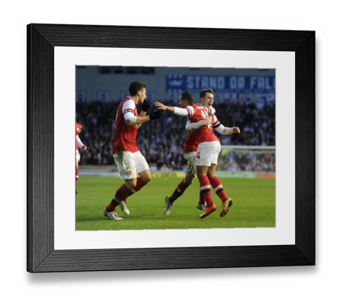 Framed Print : Theo Walcott, Olivier Giroud, and Aaron Ramsey Celebrate Arsenal's Goals Against Brighton & Hove Albion in FA Cup Match Framed Print : Theo Walcott, Olivier Giroud, and Aaron Ramsey Celebrate Arsenal's Goals Against Brighton & Hove Albion in FA Cup Match