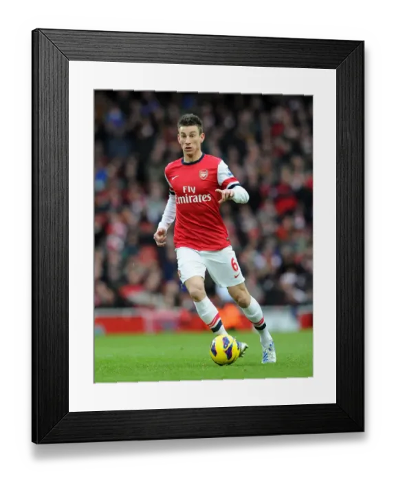 Framed Print : Arsenal's Koscielny in Action Against Stoke City (2013)