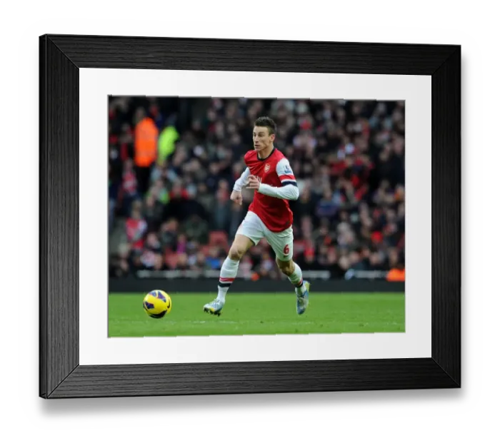 Framed Print : Arsenal's Koscielny in Action: Arsenal vs Stoke City (2013)