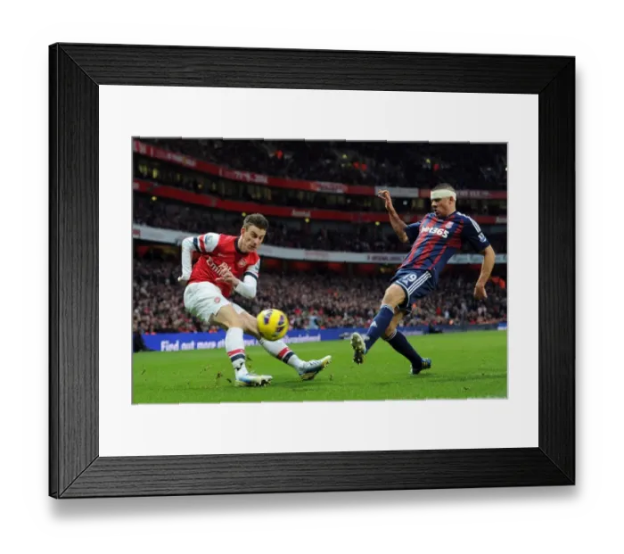 Framed Print : Arsenal vs Stoke City: Koscielny vs Walters - Premier League Tussle at Emirates Stadium