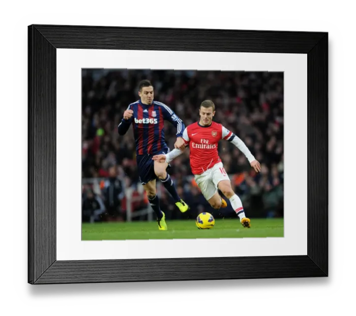 Framed Print : Jack Wilshere vs Geoff Cameron: Intense Battle at Arsenal v Stoke City, Premier League 2012-13 Framed Print : Jack Wilshere vs Geoff Cameron: Intense Battle at Arsenal v Stoke City, Premier League 2012-13