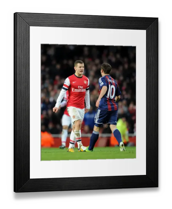 Framed Print : Arsenal vs Stoke City: Wilshere and Owen Clash in Premier League Showdown Framed Print : Arsenal vs Stoke City: Wilshere and Owen Clash in Premier League Showdown