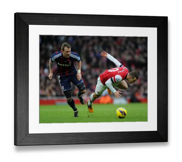 Framed Print : Battle in the Midfield: Wilshere vs. Whelan, Arsenal vs. Stoke City, Premier League 2012-13 Framed Print : Battle in the Midfield: Wilshere vs. Whelan, Arsenal vs. Stoke City, Premier League 2012-13