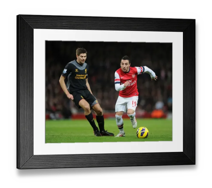 Framed Print : Santi Cazorla Outmaneuvers Steven Gerrard: Arsenal vs. Liverpool, Premier League, 2012-13 Framed Print : Santi Cazorla Outmaneuvers Steven Gerrard: Arsenal vs. Liverpool, Premier League, 2012-13