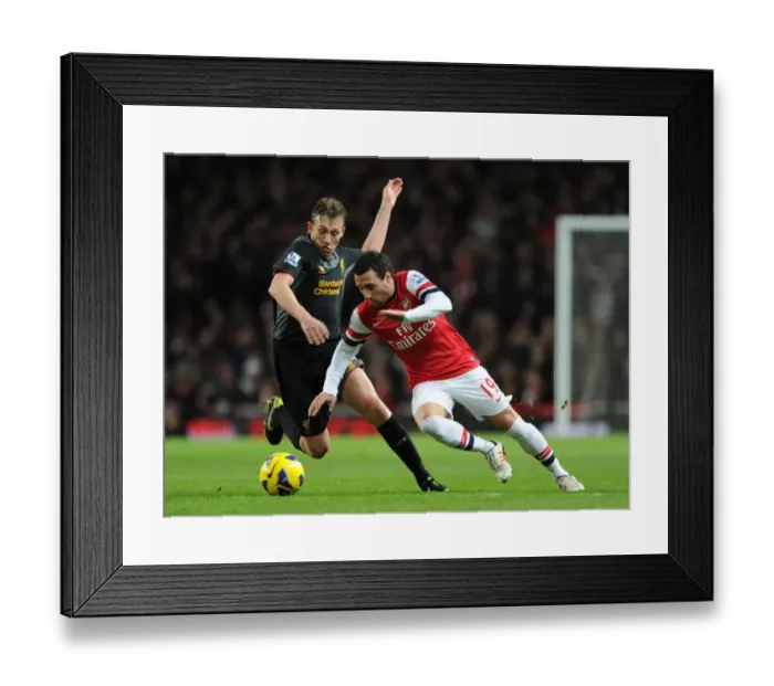Framed Print : Arsenal's Santi Cazorla Clashes with Liverpool's Lucas Leiva in Premier League Showdown Framed Print : Arsenal's Santi Cazorla Clashes with Liverpool's Lucas Leiva in Premier League Showdown