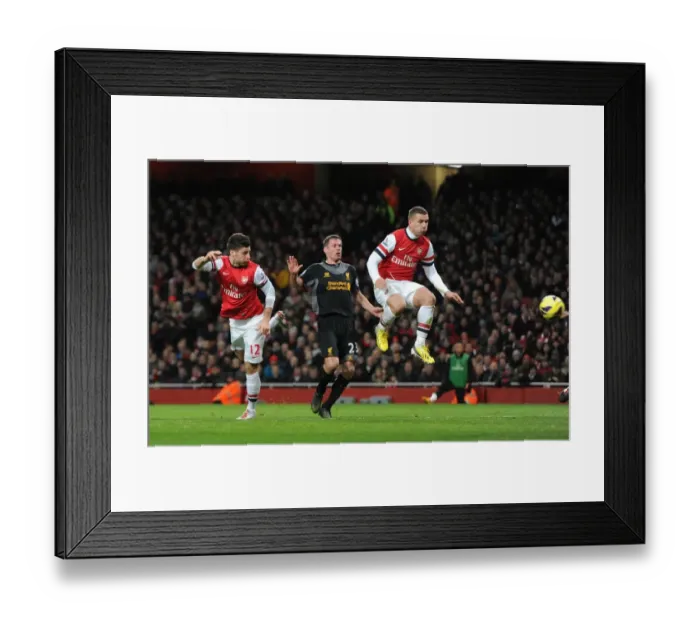 Framed Print : Olivier Giroud scores Arsenal 1st goal as he gets ahead of Jamie Carragher (Liverpool) Framed Print : Olivier Giroud scores Arsenal 1st goal as he gets ahead of Jamie Carragher (Liverpool)