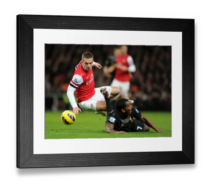 Framed Print : Podolski vs. Wisdom: A Premier League Showdown at Emirates Stadium - Arsenal vs. Liverpool (2013) Framed Print : Podolski vs. Wisdom: A Premier League Showdown at Emirates Stadium - Arsenal vs. Liverpool (2013)