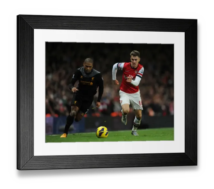 Framed Print : Arsenal's Aaron Ramsey Outmaneuvers Liverpool's Glen Johnson