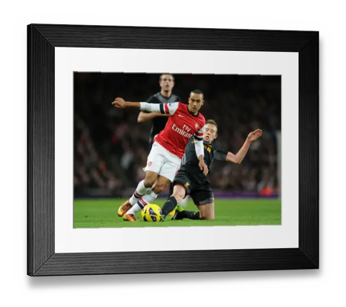 Framed Print : Arsenal vs. Liverpool: Theo Walcott vs. Lucas Leiva - A Football Rivalry Erupts (2012-13)