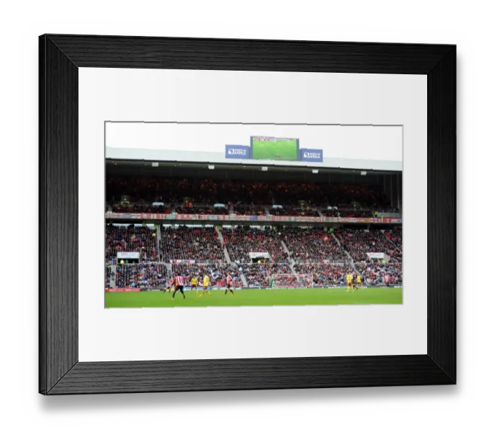 Framed Print : Away fans in upper teir. Sunderland 0: 1 Arsenal. Barclays Premier League. Stadium of Light