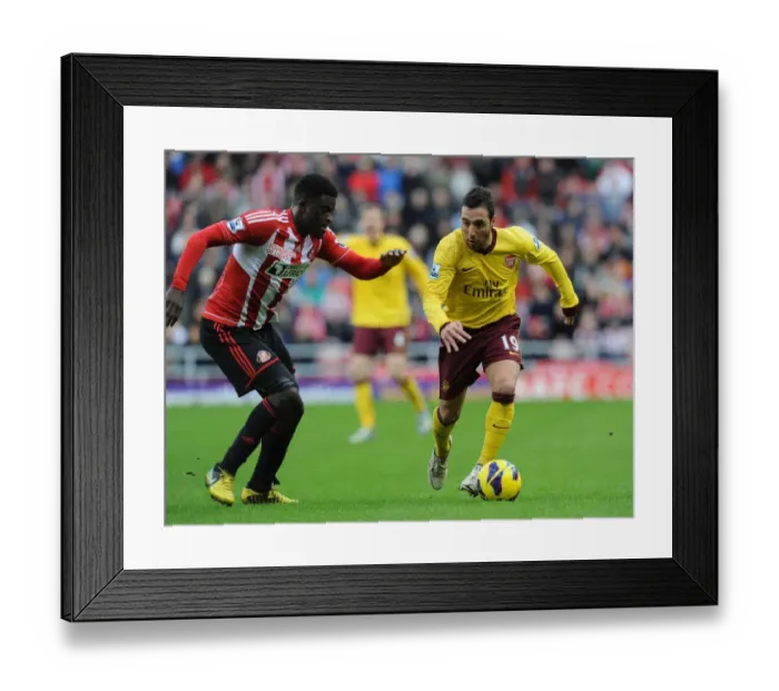 Framed Print : Clash of Midfield Titans: Santi Cazorla vs. Alfred N'Diaye - Arsenal vs. Sunderland, Premier League 2012-13 Framed Print : Clash of Midfield Titans: Santi Cazorla vs. Alfred N'Diaye - Arsenal vs. Sunderland, Premier League 2012-13