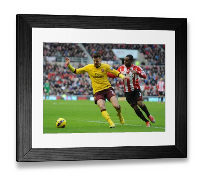 Framed Print : Arsenal's Carl Jenkinson Fends Off Sunderland's Danny Rose