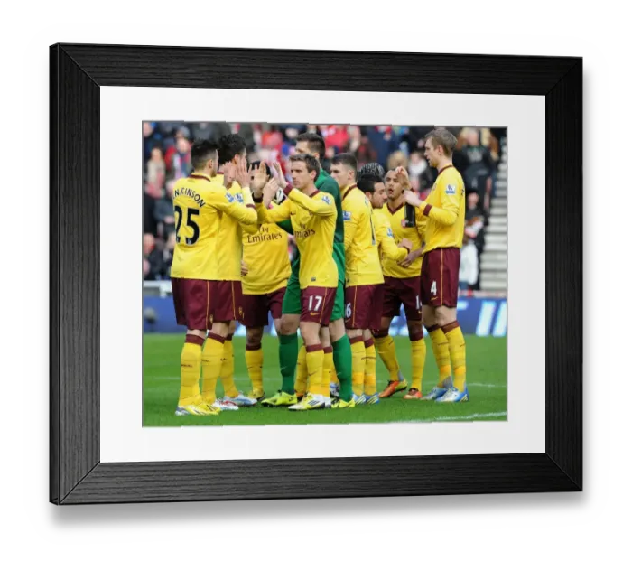 Framed Print : Arsenal Players Gear Up Before Sunderland Clash, Nacho Monreal Leading the Way (Sunderland v Arsenal 2012-13)