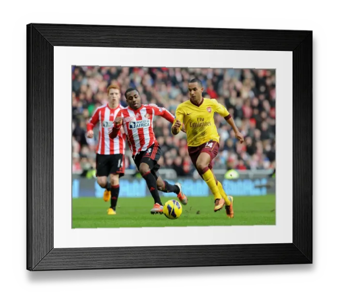Framed Print : Theo Walcott Outpaces Danny Rose: Sunderland vs. Arsenal, Premier League 2012-13 Framed Print : Theo Walcott Outpaces Danny Rose: Sunderland vs. Arsenal, Premier League 2012-13