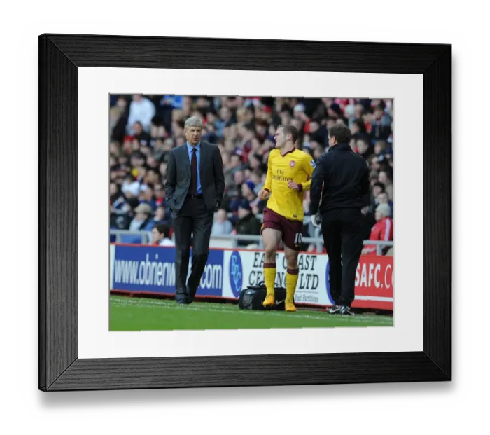 Framed Print : Arsene Wenger Tending to Jack Wilshere: A Moment of Care during Sunderland vs. Arsenal (2012-13) Framed Print : Arsene Wenger Tending to Jack Wilshere: A Moment of Care during Sunderland vs. Arsenal (2012-13)